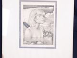 portrait of a young girl on an easel with a pencil drawing of a young girl