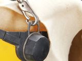 a yellow bucket with a black handle and a black strap