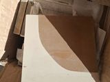 a cardboard box with a piece of paper on top of it