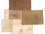 several old papers with drawings on them sitting on top of each other