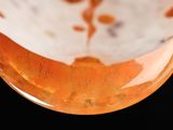 a close up of a bowl with writing on it