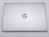 a laptop that is sitting on a white table