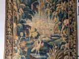 an image of a tapestry hanging on a wall in a room