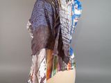 an image of a mannequin with a scarf draped over it