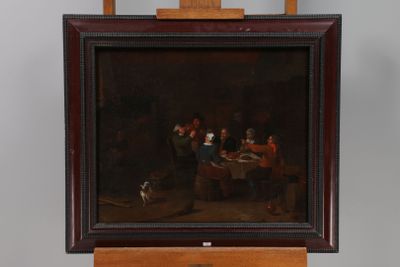 a picture of a painting on a easel with a dog in front of it