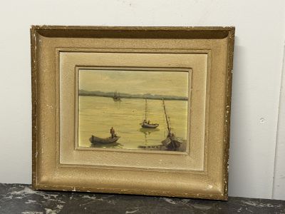 une vieille photo représentant une peinture de bateaux sur un plan d'eau
