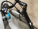 a close up of a bicycle with a handlebar
