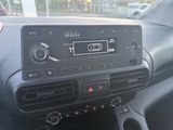 a car dashboard with a radio and other electronics in it