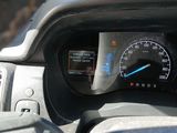 a close up of a car dashboard with a speedometer