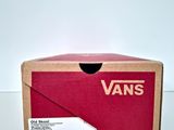 a red box with a white tag on the inside of it