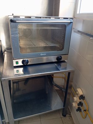 an image of a toaster oven in a commercial kitchen