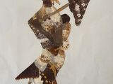 a sculpture of a woman holding a fan and a butterfly