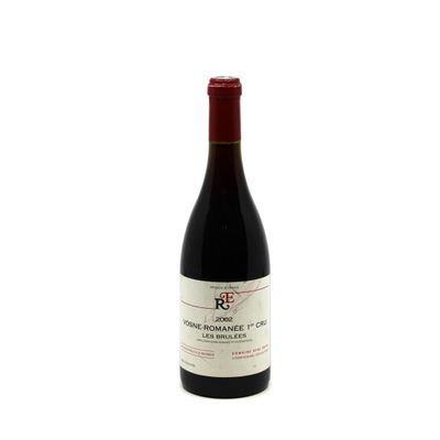 a bottle of wine that is sitting on a table