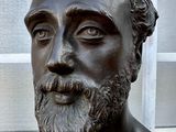 a statue of a man with a beard and a beard