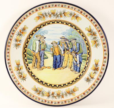 a plate with a picture of a group of people on it