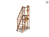 an image of a wooden staircase with a handrail on it