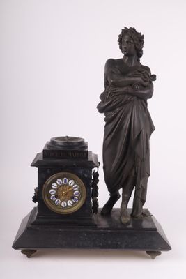 Pendule en régule et marbre noir