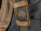 a brown bag with a brown strap and a brown bag with a brown handle