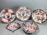 six different types of plates and bowls with designs on them