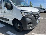 a white van that is parked in a parking lot