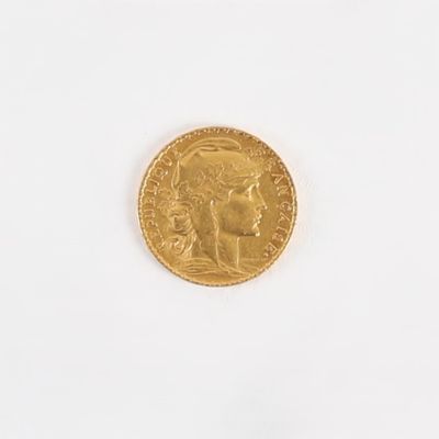 an image of a gold coin with a woman ' s face on it