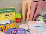 a lot of school supplies on the table