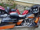 two motorcycles that are parked next to each other