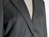 a close up of a suit on a mannequin mannequin mannequin mannequin mannequin mannequin mannequin mann