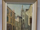 framed painting of a street scene with a church steeple in the background