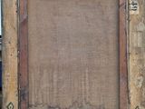 an old wooden frame with a picture of a cat on it ' s side