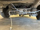 the rear end of a truck with a tow rope attached to it ' s bumper
