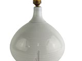 an image of a white vase with a light on it