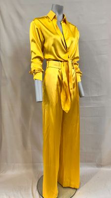 yellow satin jumpsuit with belted waist and tie belt