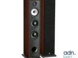 a pair of speakers sitting next to each other on a white background