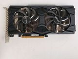 a close up of a video card with a fan on top of it
