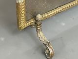 an image of a picture of a gold frame with a clock on it