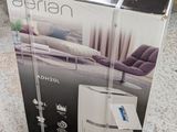 packaging for a new air purifier sitting on the floor