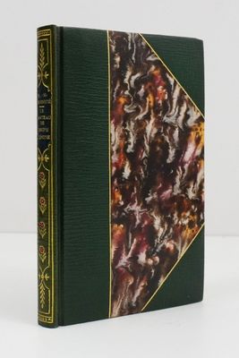 a green book with a picture of a group of people on it