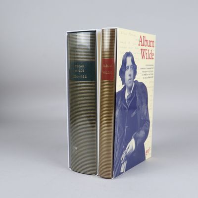 two books sitting on top of each other on a table