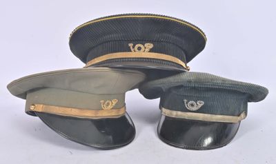 three hats that are sitting on top of each other on a table