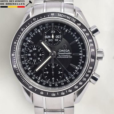 an image of a close up of a watch on a white surface