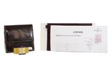 a checkbook and a wallet sitting next to each other