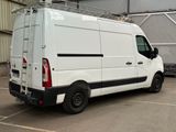 a white van that is parked in a parking lot