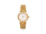 a lady ' s diamond set gold wrist watch