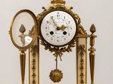 a clock that is sitting on top of a table