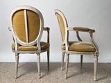 pair of french louis xvi style armchairs with upholstered seats