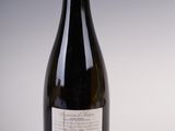 a bottle of wine that is sitting on a table