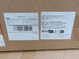 a box with a label on it sitting on the floor