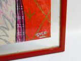 a picture of a picture of a woman in a red frame