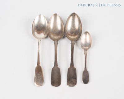 five spoons and two spoon spoons on a white surface
